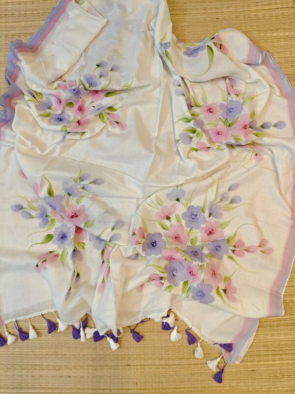 Handloom Mulmul Cotton with Hand-painted Floral Motifs.
